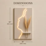 That's a beautiful piece — a glowing face silhouette LED wall art with a mini shelf and pampas grass. Very on-trend for home decor! - Image 4